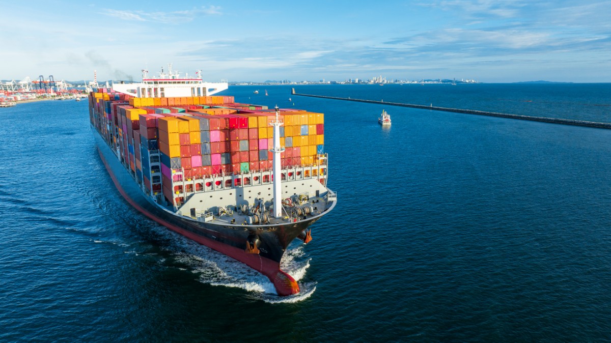 aerial side view of cargo ship carrying container 2024 12 08 00 48 31 utc.jpg
