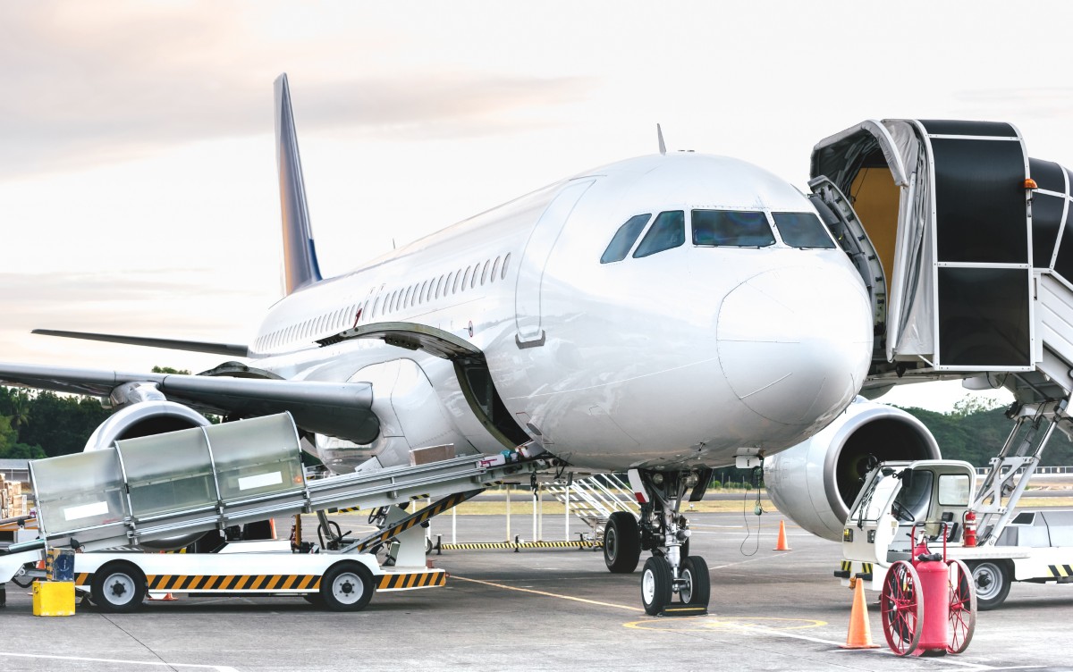 side view of airplane at airport terminal gate 2024 07 03 02 44 15 utc.jpg